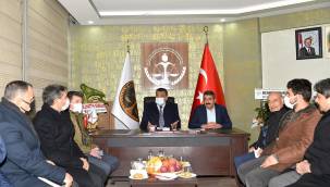 GÜRKAN SEYYAR PAZARCILAR ESNAF ODASINI ZİYARET ETTİ